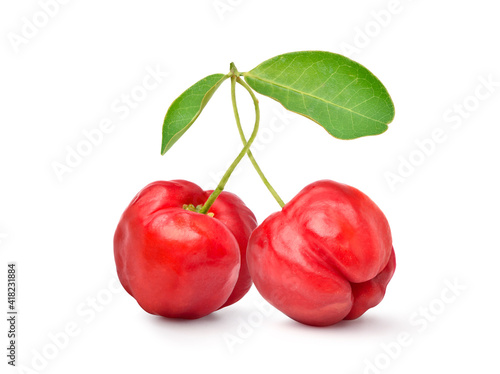 Two Juicy red Acerola cherry fruits with green leaf isolated on white background. Clipping path.
