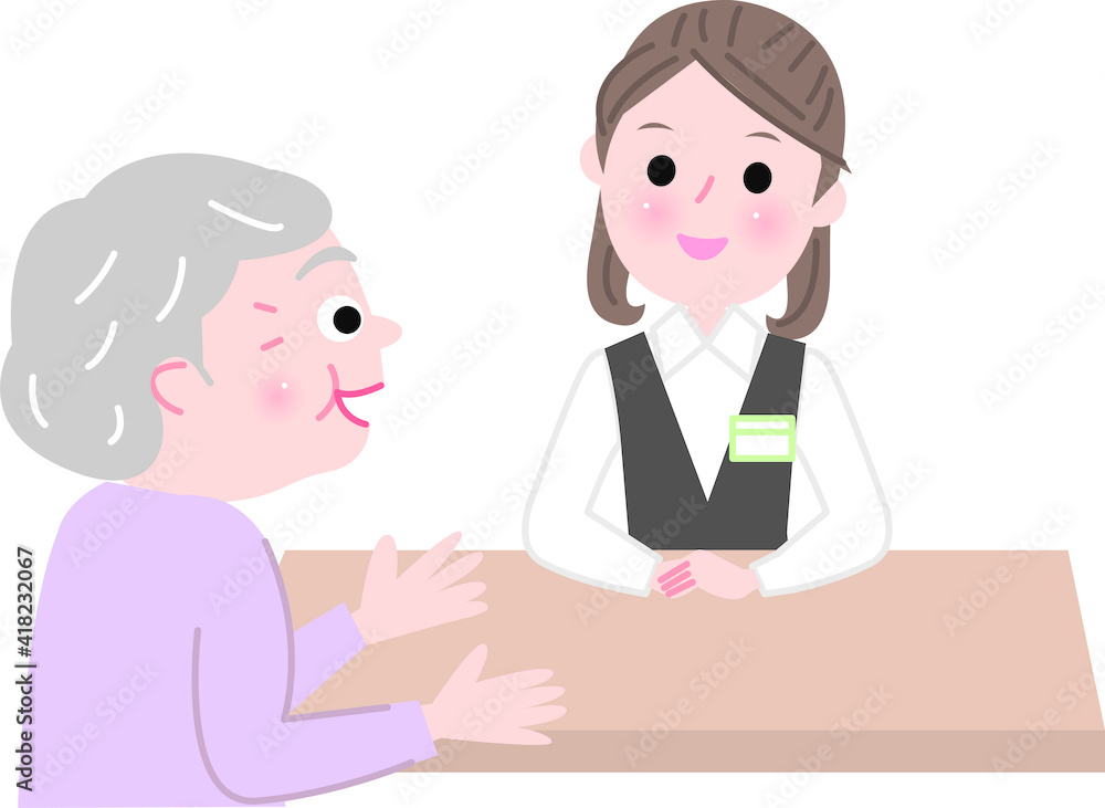 受付に行くシニア女性