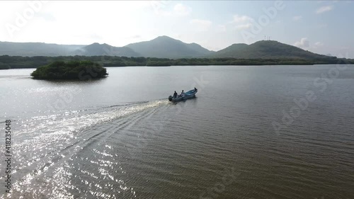 Boat on the lagoon and the mangroves of Veracruz la mancha photo
