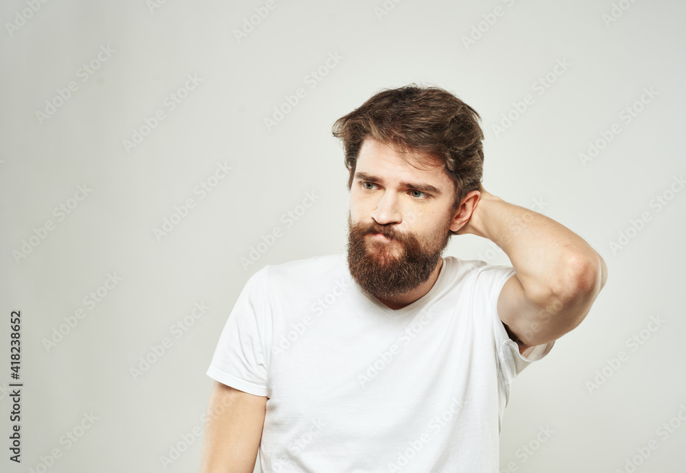 The guy gestures with his hands a puzzled look of emotion of bewilderment The guy gestures with his hands a puzzled look of emotion of bewilderment