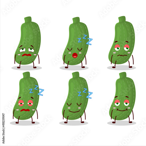 Cartoon character of zucchini with sleepy expression