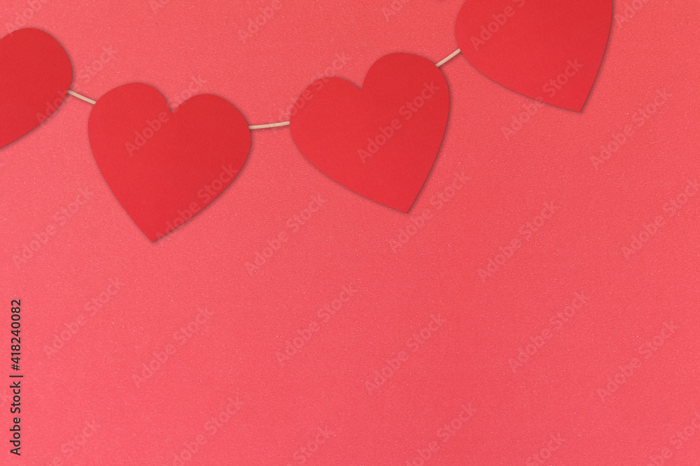 Garlands of hearts, red background. Paper texture. Love. In love. Copy space