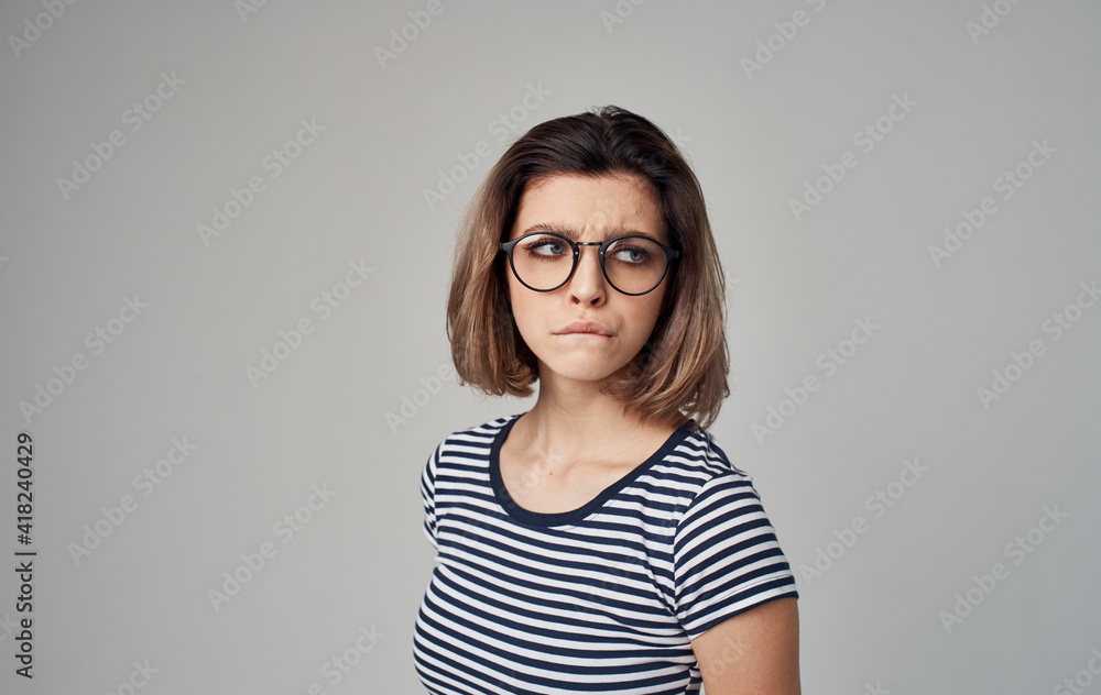 Obraz premium woman in striped t-shirt emotion smile glasses model