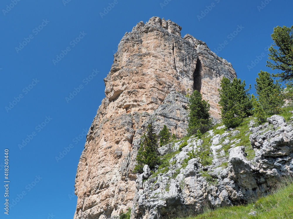 Cortina, Italy. Amazing view of the climbers on the walls of the famous rocks of the 5 towers. Extreme climbing. Outdoors activities. Dolomites Unesco world heritage. Dolomites in Italy. summer time Cortina, Italy. Amazing view of the climbers on the walls of the famous rocks of the 5 towers. Extreme climbing. Outdoors activities. Dolomites Unesco world heritage. Dolomites in Italy. summer time