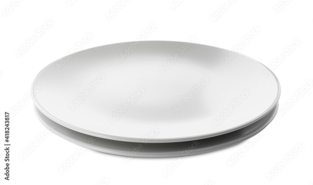 Clean empty ceramic plates on white background Clean empty ceramic plates on white background