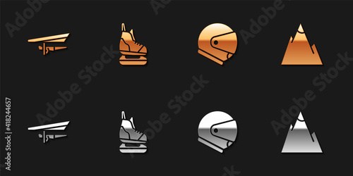 Set Hang glider, Skates, Helmet and Mountains icon. Vector.