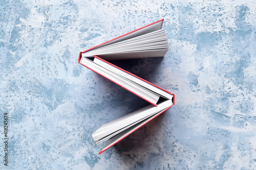 Open red book with blank pa...