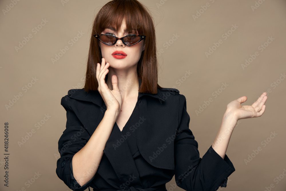 Brunette points her hand to the side elegant appearance Brunette points her hand to the side elegant appearance