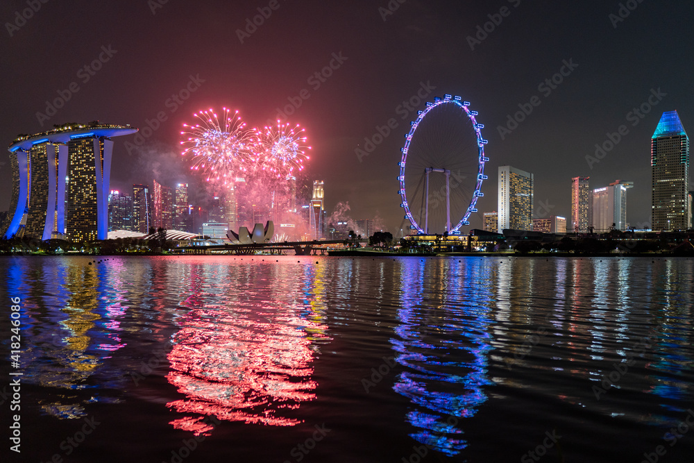 Fireworks and Singapore skyline.
