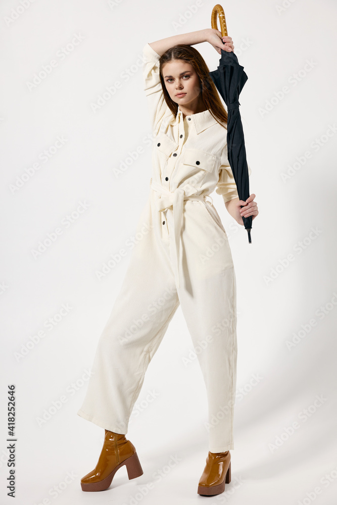 pretty woman in suit umbrella in hands protection from rain modern style pretty woman in suit umbrella in hands protection from rain modern style