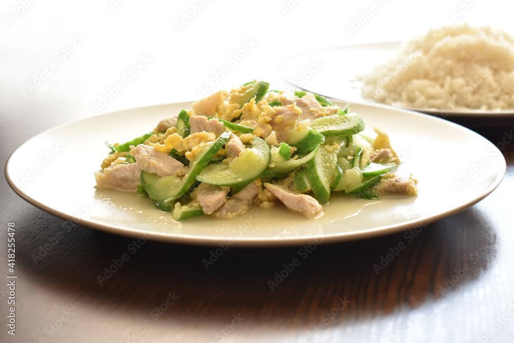 Stir fried cucumber with pork and egg. Thai style food.