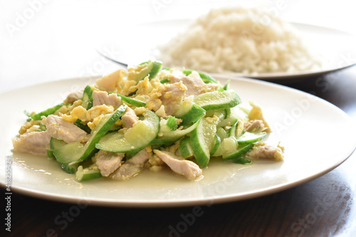 Stir fried cucumber with pork and egg. Thai style food.