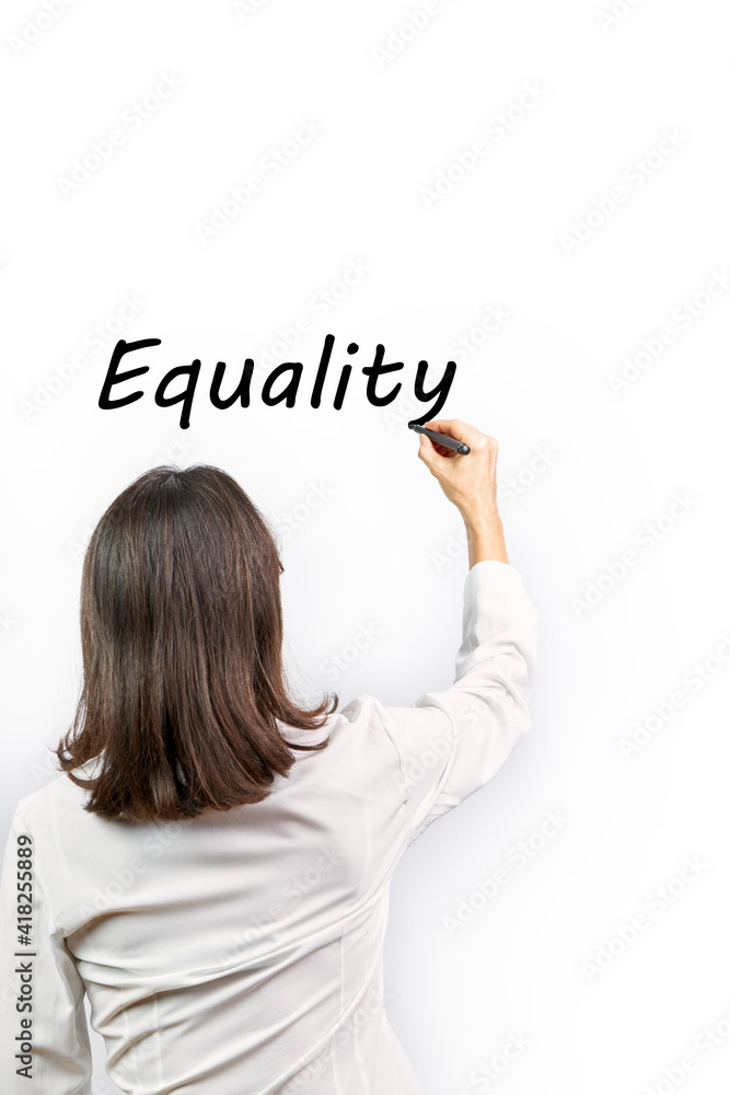 Woman writing the word Equality on white background. Concept feminism Woman writing the word Equality on white background. Concept feminism