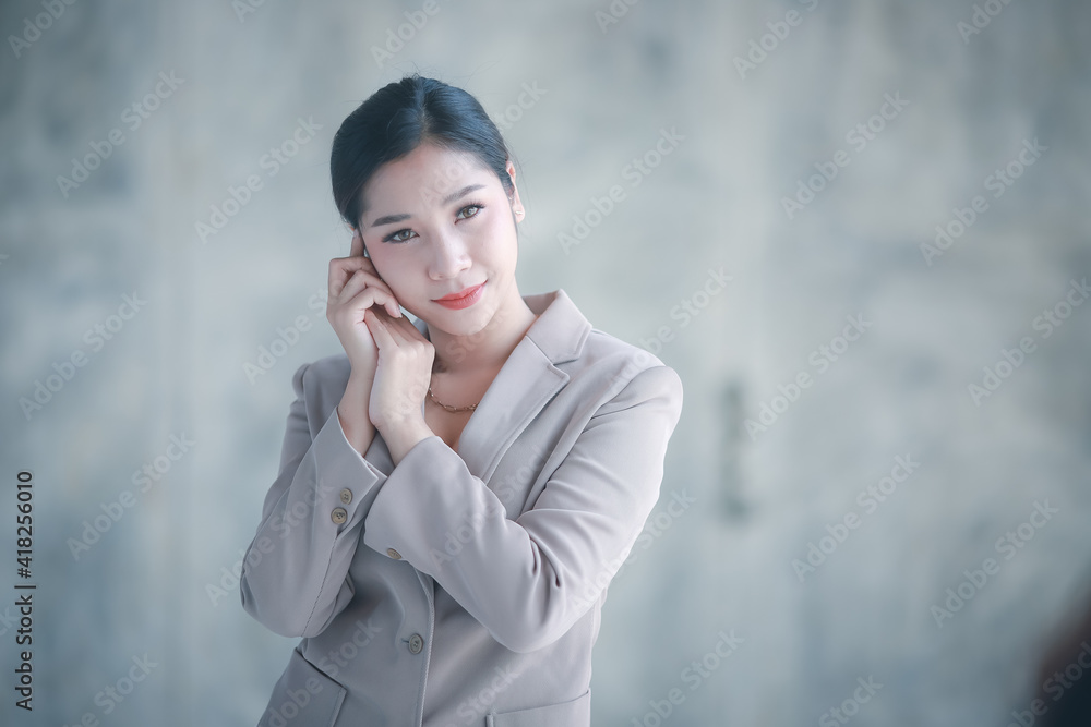 Portrait of smile women business work in the office.Portrait of happy Smiling Businesswoman in fashionable clothes.business concept. Portrait of smile women business work in the office.Portrait of happy Smiling Businesswoman in fashionable clothes.business concept.