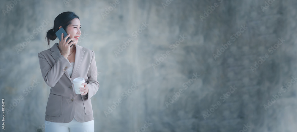 Banner portrait of smile women business work in the office.Portrait of  happy  Smiling Businesswoman in fashionable clothes.business concept.