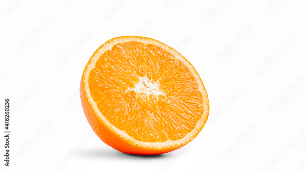 Cut in half and slice a ripe orange fruit with golden yellow peel. Isolated on white background with shadow. Cut in half and slice a ripe orange fruit with golden yellow peel. Isolated on white background with shadow.
