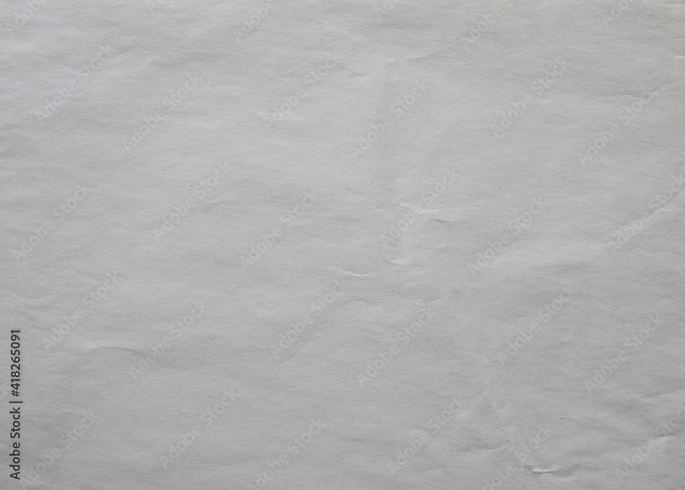 Obraz premium Crumpled off white paper texture background.