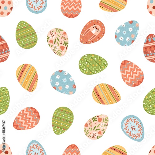 Seamless pattern with various painted Easter eggs on white background. Repeatable spring festive texture. Endless backdrop for printing. Hand-drawn colored flat vector illustration