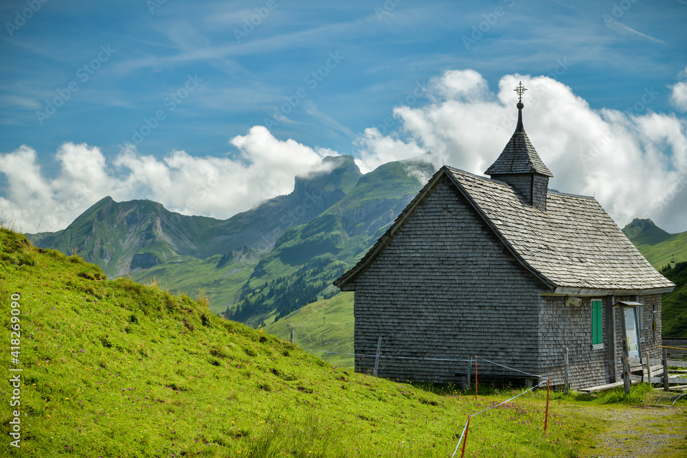 Small wooden chapel high in the mountains above Oberiberg in Switzerland