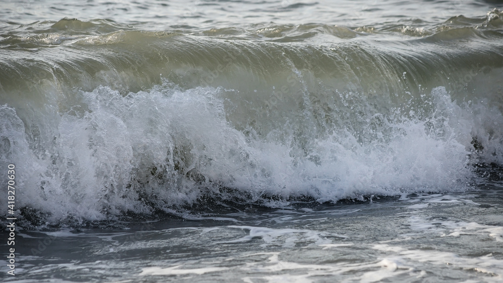 Sea wave close-up. Sea foam.