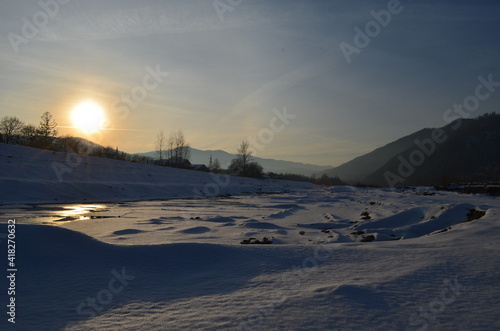 Winter landscape with the river in frosty day