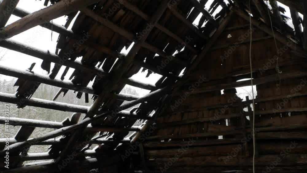 Destroyed wooden roof of an old country house Destroyed wooden roof of an old country house