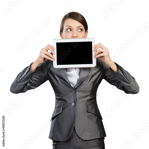 Businesswoman with tablet computer looking away