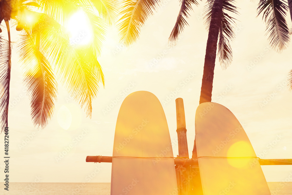 Surfboard and palm tree on beach background. Stock Photo | Adobe Stock