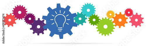 colored team work gears with light bulb