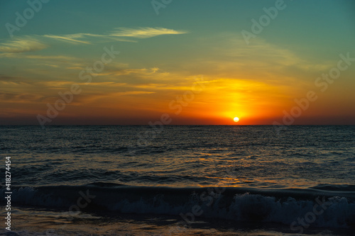Sunrise above the sea © PaulDaniel
