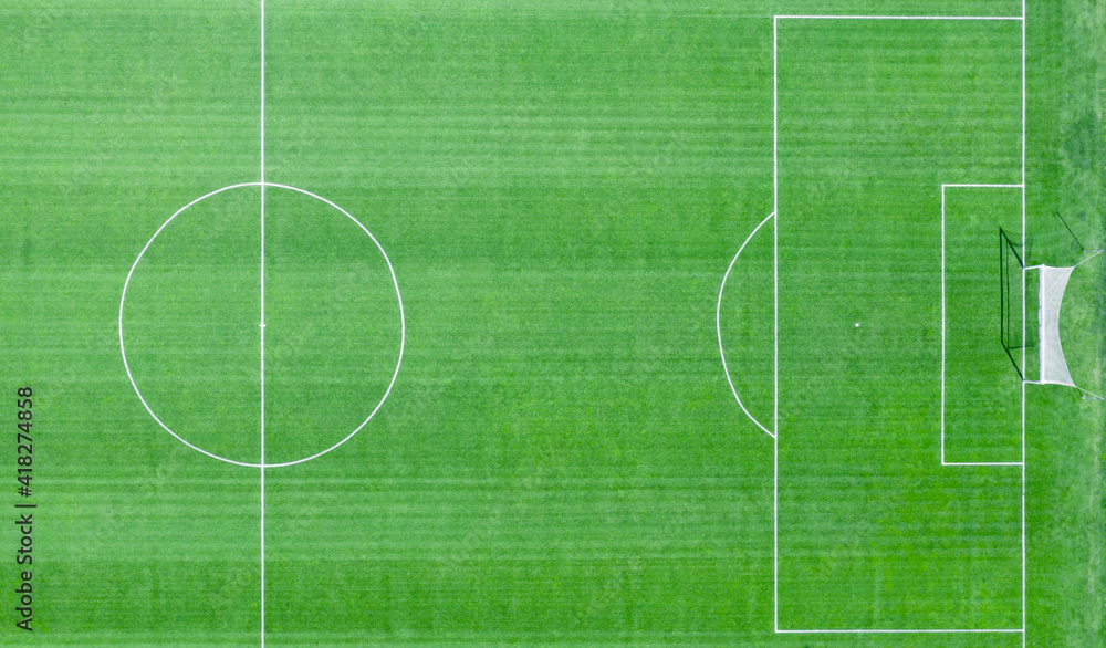 Soccer field with white markings. Top view.