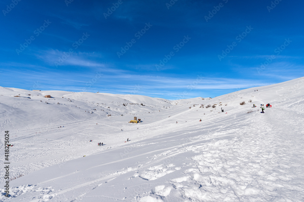 Malga San Giorgio Ski Resort in winter with snow. Lessinia Plateau (Altopiano della Lessinia), Regional Natural Park, Bosco Chiesanuova Municipality, Verona province, Veneto, Italy, Europe.