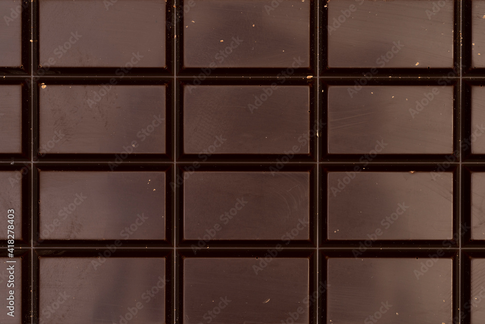 Macro photo of a sweet, delicious bar of chocolate photo taken from above Macro photo of a sweet, delicious bar of chocolate photo taken from above