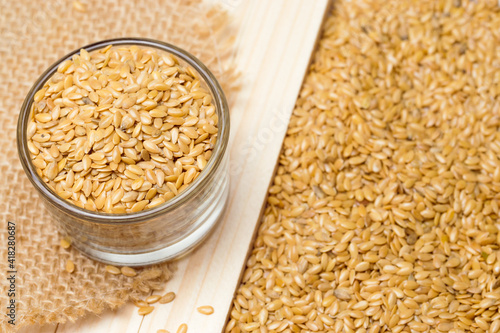 Golden flaxseed or linseed, close up, healthy eating