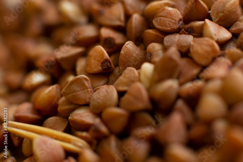 buckwheat closeup background. dry buckwheat texture The concept of diet and healthy eating
