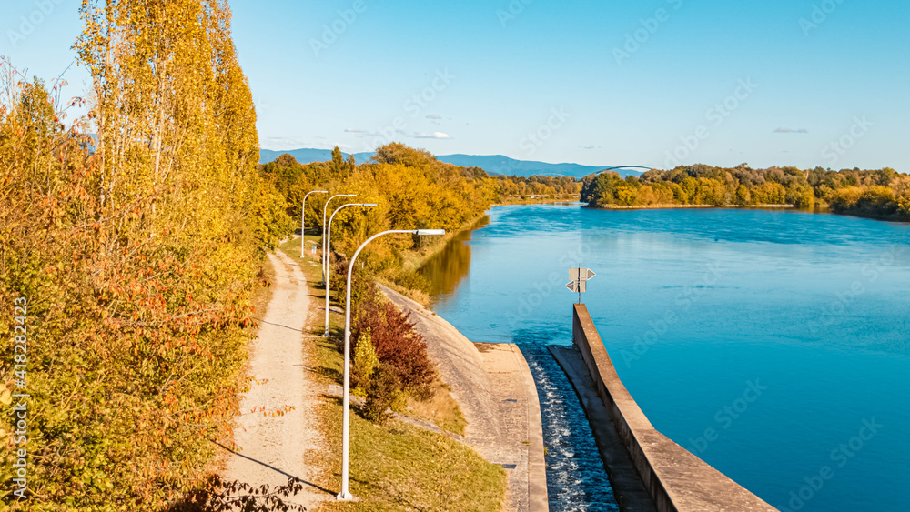 Beautiful autumn or indian summer view with a fish ladder at the danube lock near Straubing, Bavaria, Germany