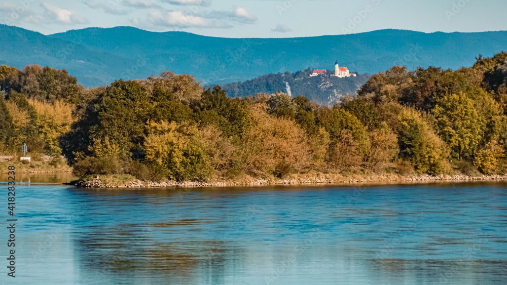 Beautiful autumn or indian summer view with the famous Bogenberg in the background at the danube lock near Straubing, Bavaria, Germany Beautiful autumn or indian summer view with the famous Bogenberg in the background at the danube lock near Straubing, Bavaria, Germany