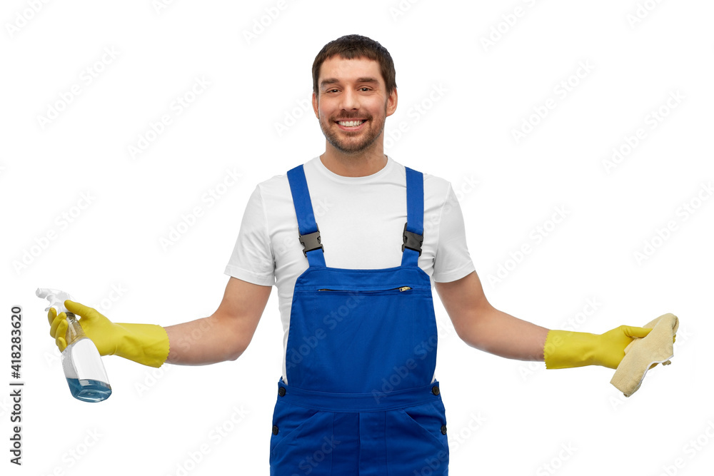 profession, cleaning service and people concept - happy smiling male worker or cleaner in overall and gloves with rag and detergent over white background profession, cleaning service and people concept - happy smiling male worker or cleaner in overall and gloves with rag and detergent over white background