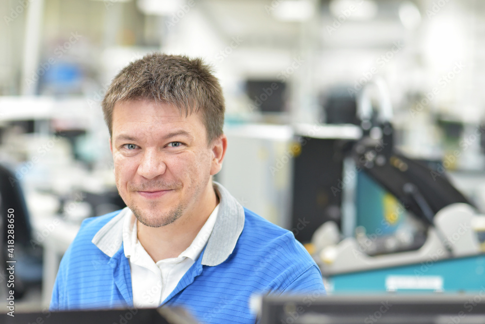 production of electronic components in a modern factory - engineer at the workplace production of electronic components in a modern factory - engineer at the workplace