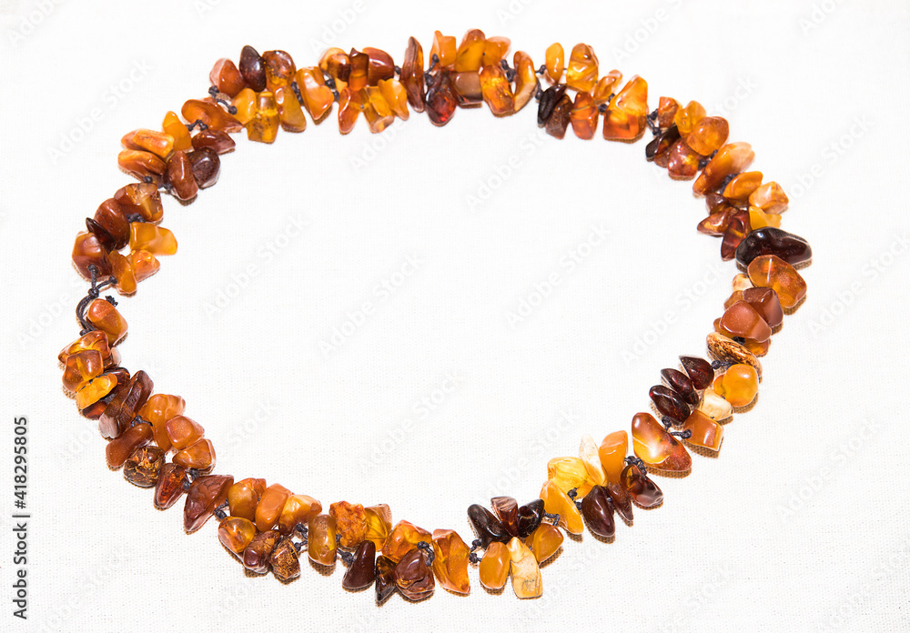 Jewelry made of natural amber stones. Selective focus. Jewelry made of natural amber stones. Selective focus.