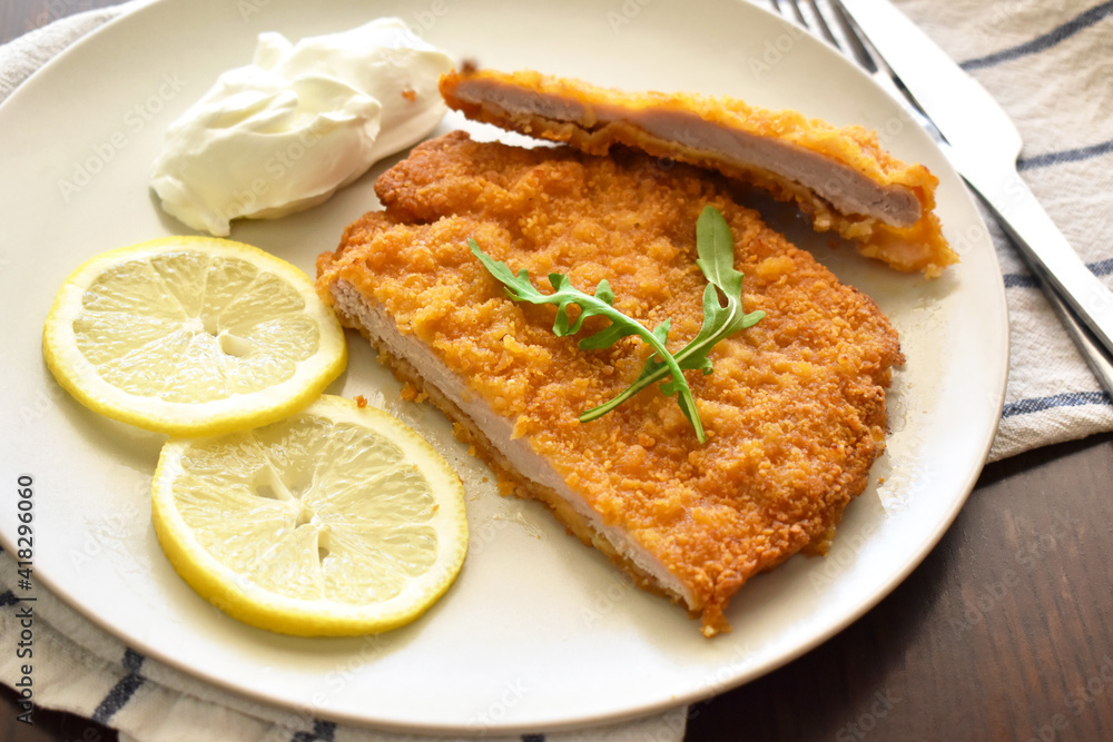 Pork Schnitzel on a plate. Pork Schnitzel on a plate.