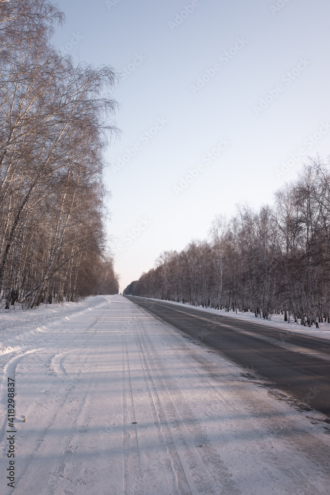 Snowy winter road in the forest Snowy winter road in the forest