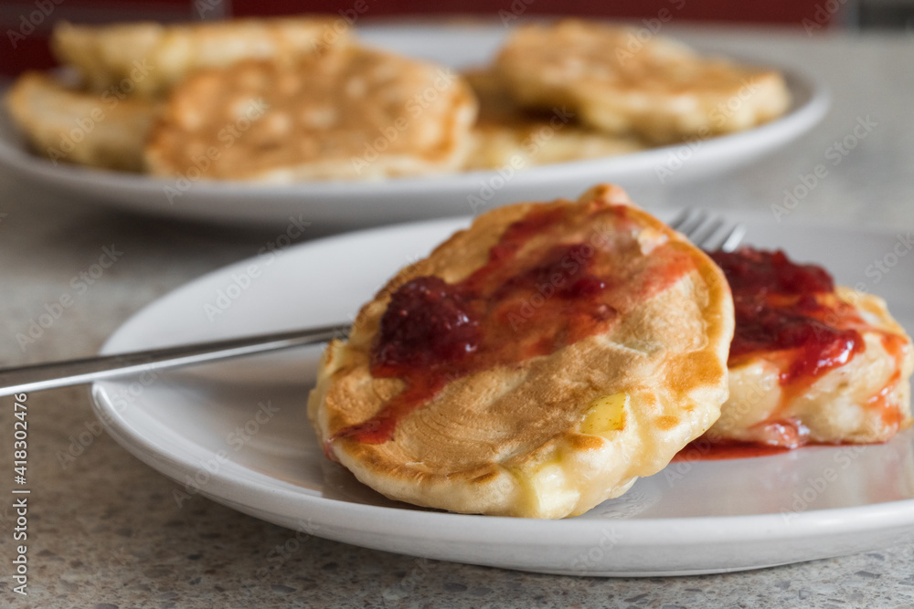 apple fritters on a white plate apple fritters on a white plate