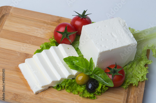 Healthy fresh meal white cheese and tomatoes and olives