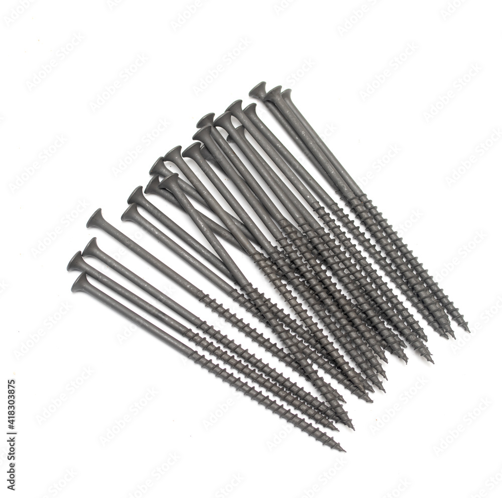 metal screws with long dark thread on white background metal screws with long dark thread on white background