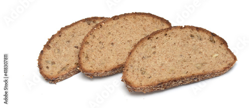sliced rye bread loaf on a white plate