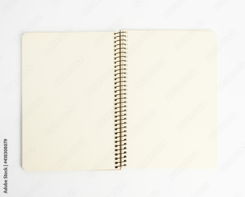 open spiral notepad with blank white sheets on white background open spiral notepad with blank white sheets on white background