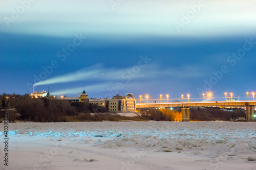 sunset over the river in winter in Omsk