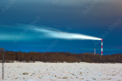sunset over the river in winter in Omsk