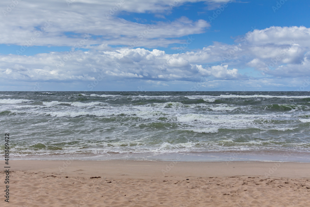 Baltic sea at noon with waves.